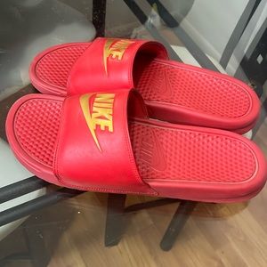 Red Nike slips
